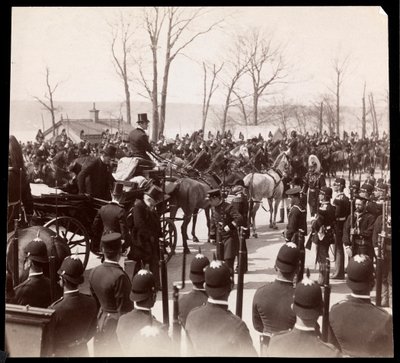 View of the crowd and military men surrounding a carriage with President Harrison at Grant